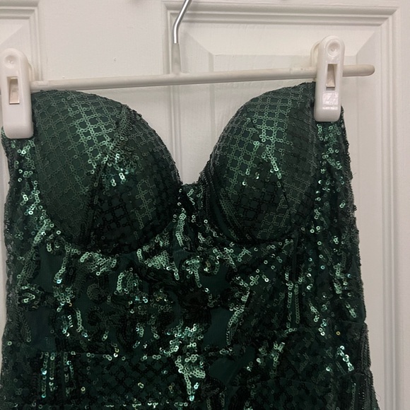 Full length emerald green sequin evening dress